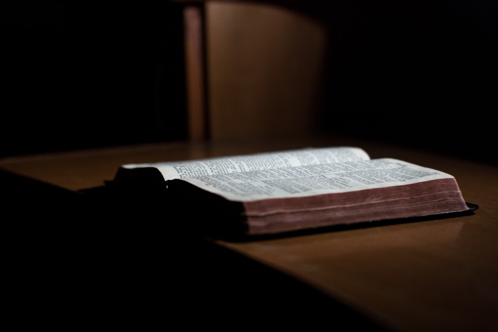 Once we come to see the need to observe the biblical festivals as God commands, a question naturally arises: Where do we get the financial resources to attend them? A Bible laying on a table.