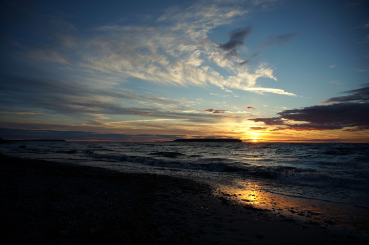 The wonderful news of the coming Kingdom of God is the heart and core of Jesus Christ's message for humanity. Sunset over the ocean.